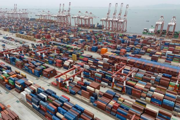 Shipping containers are seen ready for transport at the Guangzhou Port in the Nansha district in southern China